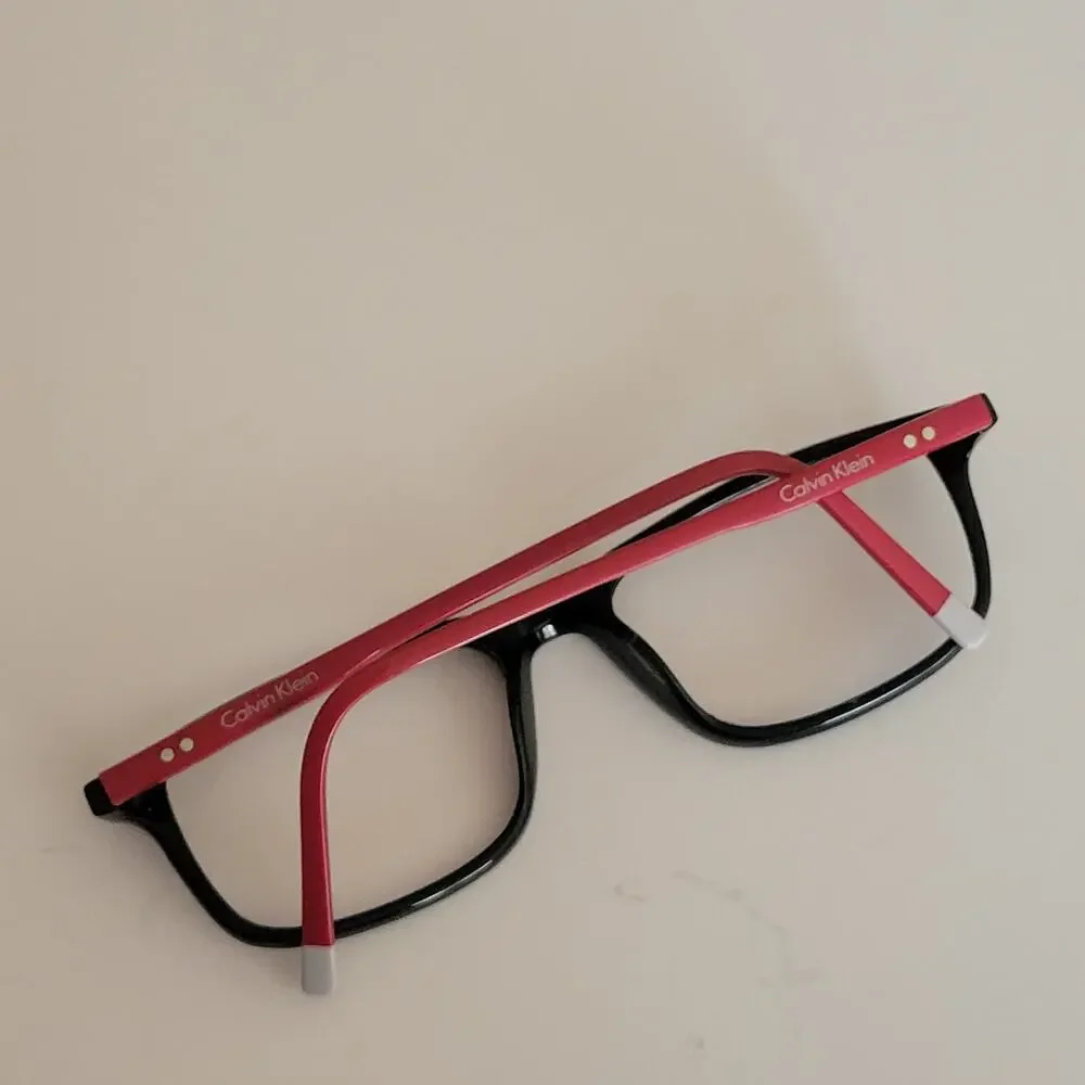 Calvin Klein CK59561 model featuring a black and red frame design 53X17X140